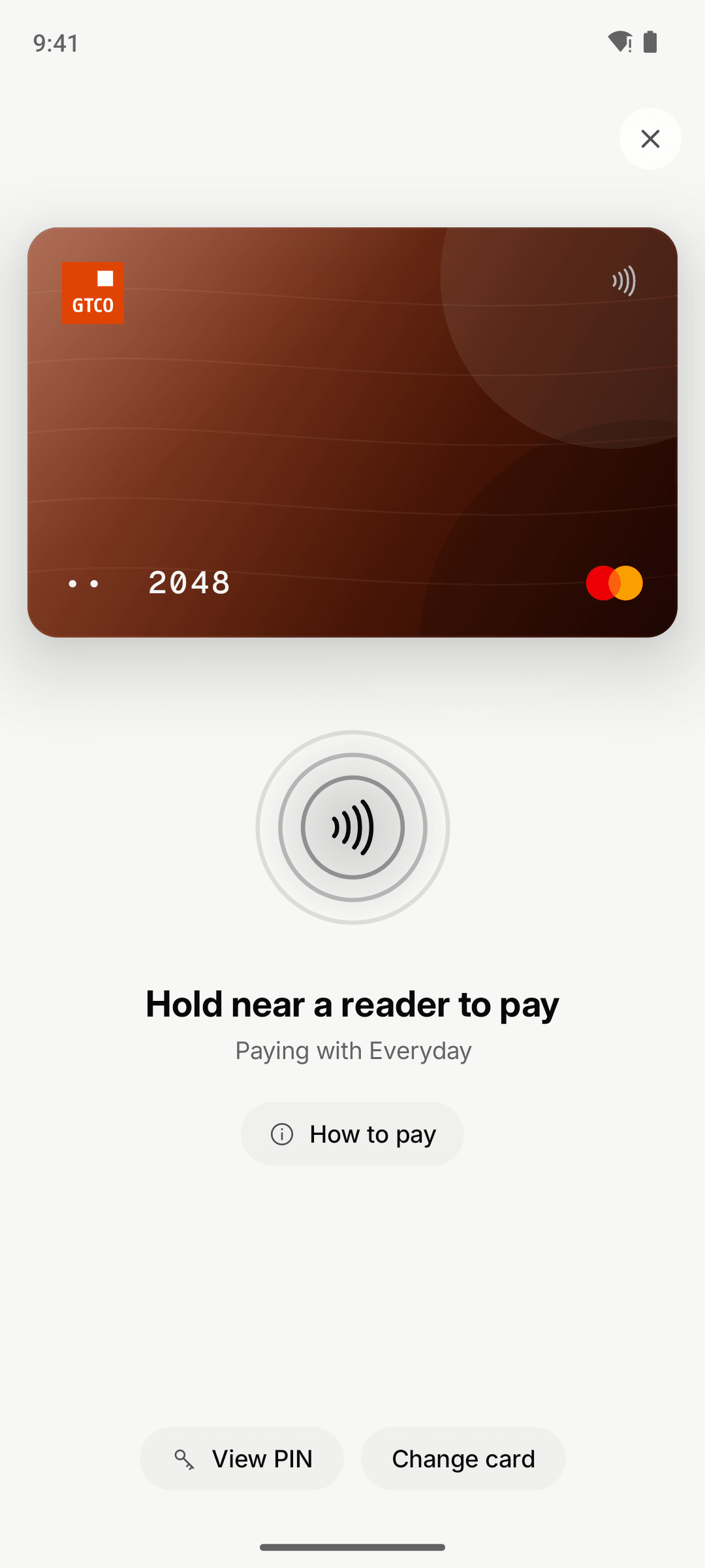 Pay Mode on Android: the GTBank card ending 2048 above the prompt to hold the phone near a reader